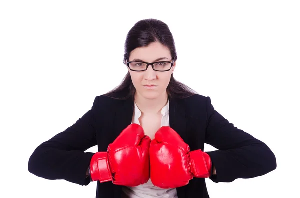 Femme d'affaires avec gants de boxe sur blanc — Photo