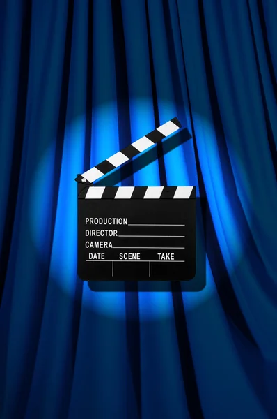 Movie clapper board against curtain — Stock Photo, Image