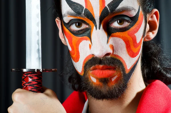 Homem com espada e máscara facial — Fotografia de Stock