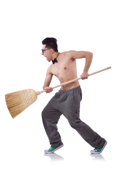 一个带着扫帚的有趣男人 — 图库照片