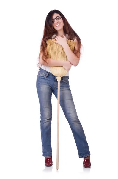 Young woman with broom isolated on white — Stock Photo, Image