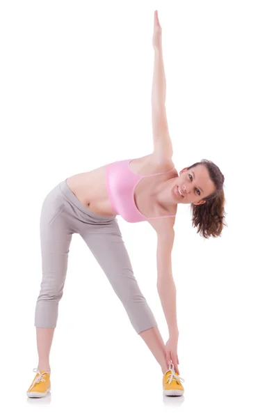 Young woman doing exercises on white — Stock Photo, Image