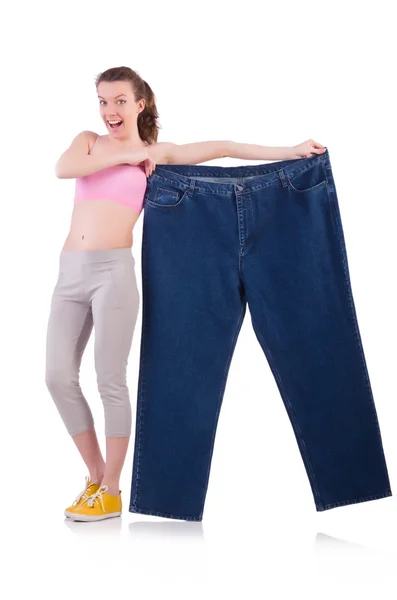 Mujer en concepto de dieta con jeans grandes —  Fotos de Stock