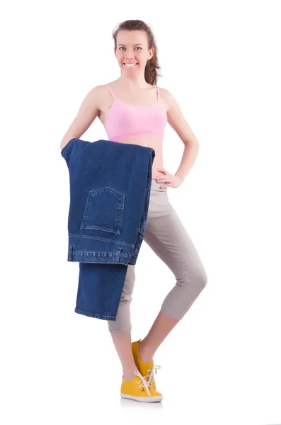 Žena v dietě koncept s velkými džínami — Stock fotografie