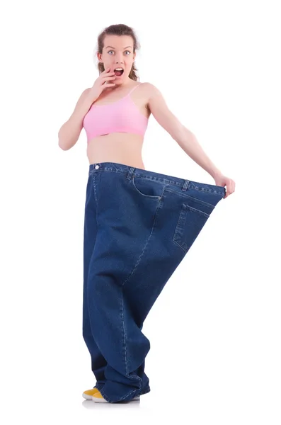 Frau im Diätkonzept mit großen Jeans — Stockfoto