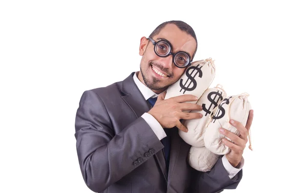 Mann mit Geldsäcken auf Weiß — Stockfoto