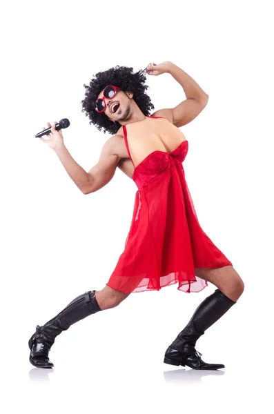 Man in female clothing singing with mic — Stock Photo, Image