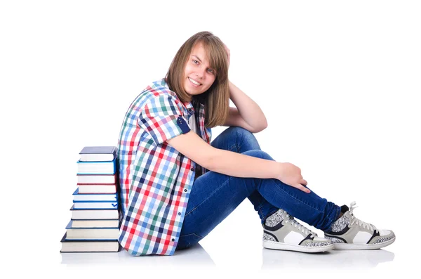 Estudante com livros sobre branco — Fotografia de Stock