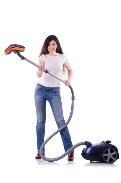 Young woman with vacuum cleaner on white — Stock Photo, Image