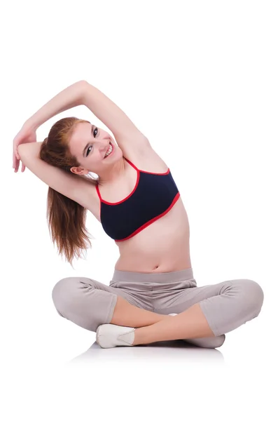 Joven hembra haciendo ejercicios en blanco — Foto de Stock