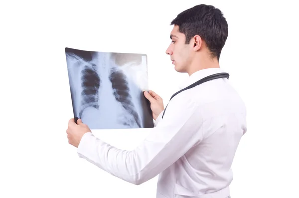 Jeune médecin avec image radiographique sur blanc — Photo