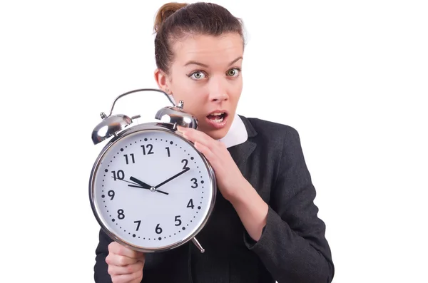 Woman with giant clock on white — Stock Photo, Image