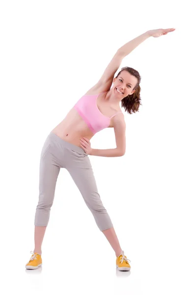 Young woman doing exercises on white Stock Photo