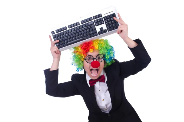 Funny clown with keyboard on white — Stock Photo, Image