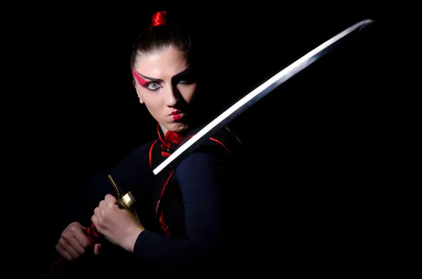 Vrouw in japans martial art concept — Stockfoto