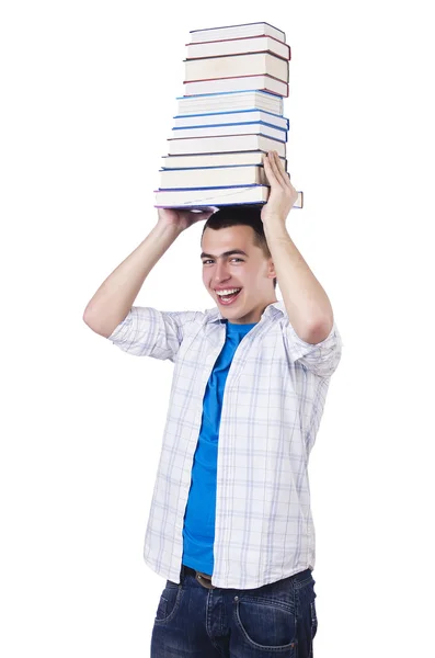 Student mit vielen Büchern auf weiß — Stockfoto