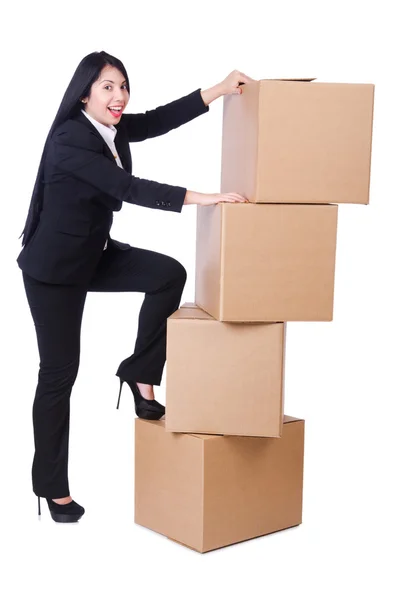 Woman with lots of boxes on white — Stock Photo, Image