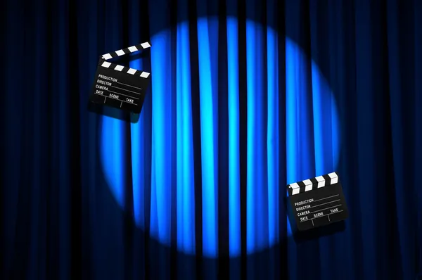 Movie clapper board against curtain — Stock Photo, Image