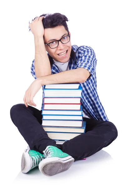 Étudiant avec beaucoup de livres sur le blanc — Photo