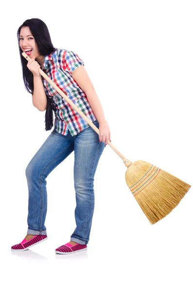 Young woman with broom isolated on white — Stock Photo, Image