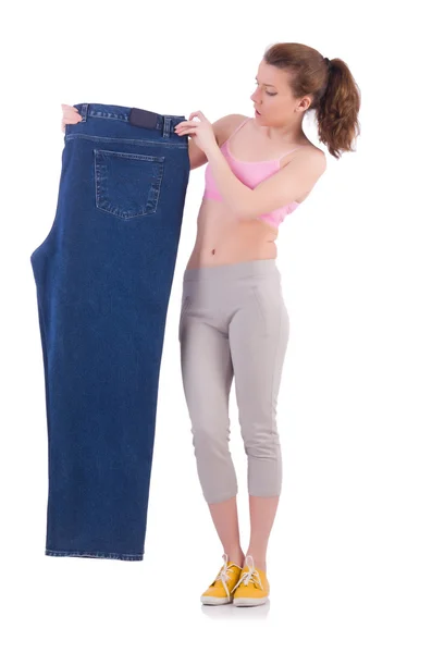 Žena v dietě koncept s velkými džínami — Stock fotografie