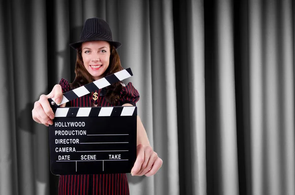 Woman gangster with movie clapper — Stock Photo, Image