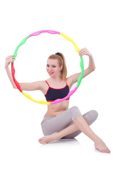 Mulher fazendo exercícios com hula hoop — Fotografia de Stock