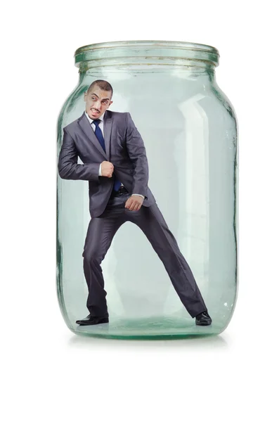 ガラスの瓶に青年実業家 — ストック写真
