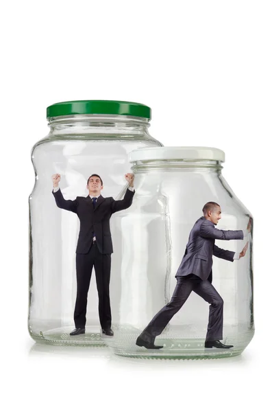 Young businessman in glass jar — Stock Photo, Image