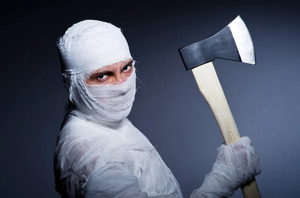 Mummy with axe in halloween concept — Stock Photo, Image