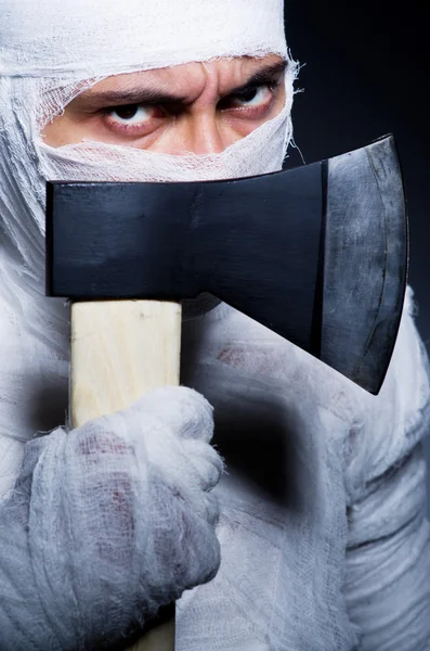 Mummy with axe in halloween concept — Stock Photo, Image