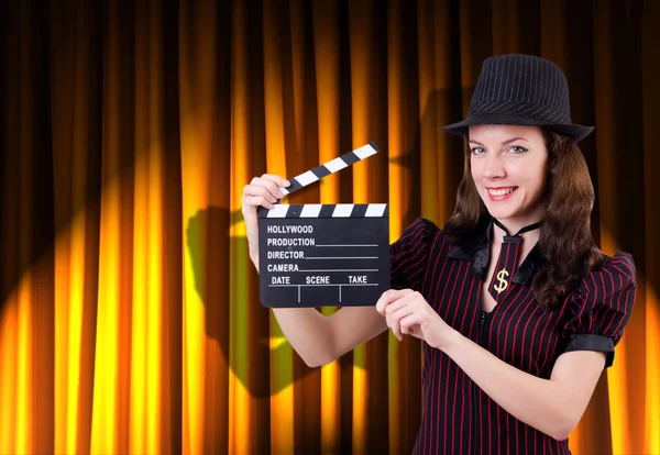 Woman gangster with movie clapper — Stock Photo, Image