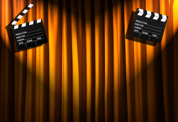 Movie clapper board against curtain — Stock Photo, Image