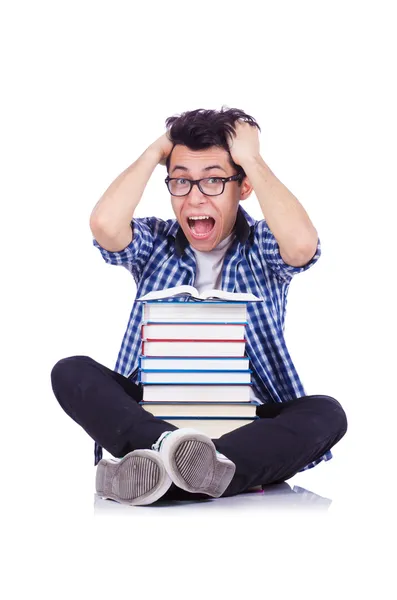 Estudiante con muchos libros sobre blanco — Foto de Stock