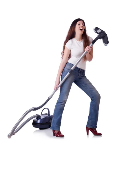 Jeune femme avec aspirateur sur blanc — Photo