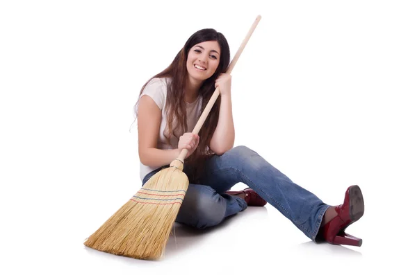 Young woman with broom isolated on white — Stock Photo, Image