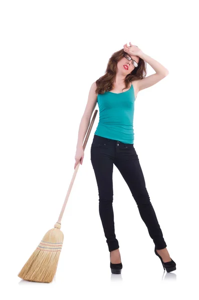 Young woman with broom isolated on white — Stock Photo, Image