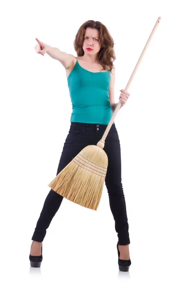 Young woman with broom isolated on white — Stock Photo, Image