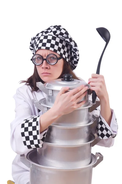 Cook with stack of pots on white — Stock Photo, Image