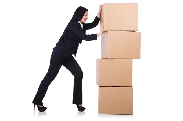Жінка з великою кількістю коробок на білому — стокове фото