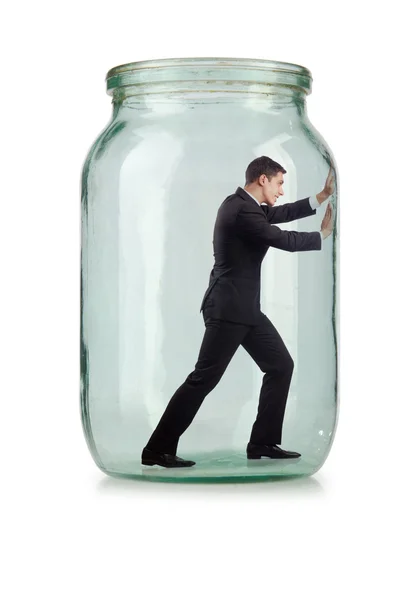 Jovem empresário em frasco de vidro — Fotografia de Stock