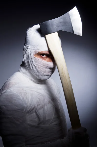 Mummy with axe in halloween concept — Stock Photo, Image