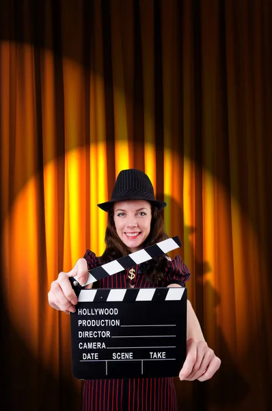 Woman gangster with movie clapper — Stock Photo, Image