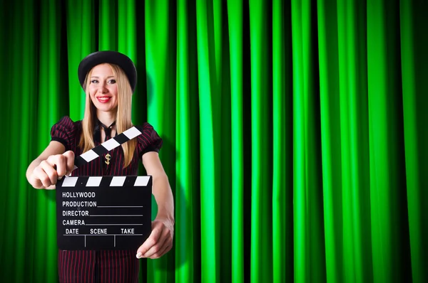 Woman gangster with movie clapper — Stock Photo, Image