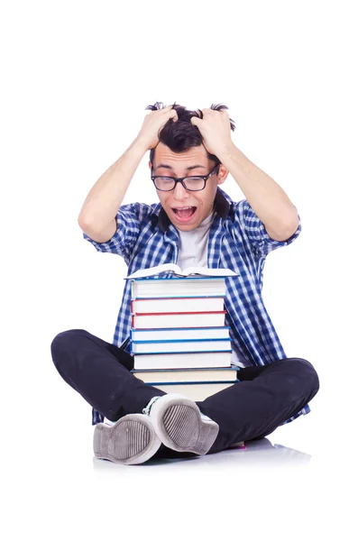 Student with lots of books on white — Stock Photo, Image