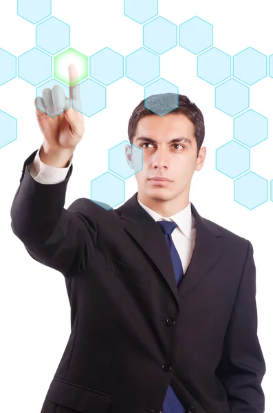 Young businessman pressing virtual buttons — Stock Photo, Image