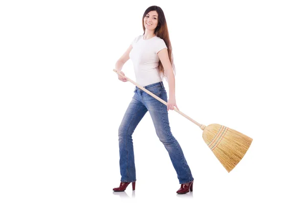 Young woman with broom isolated on white — Stock Photo, Image