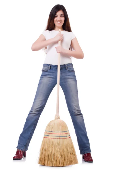 Jeune femme avec balai isolé sur blanc — Photo