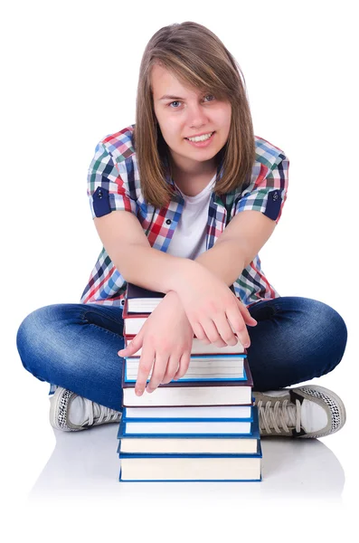 Estudante com livros sobre branco — Fotografia de Stock