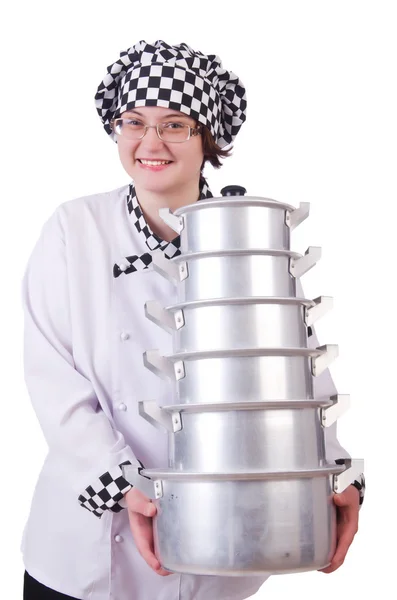 Cook with stack of pots on white — Stock Photo, Image